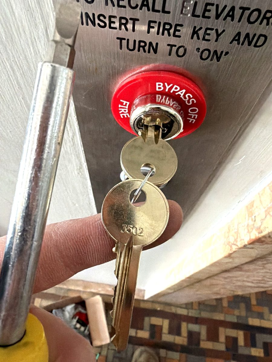 A fire service elevator key switch — institutional work most locksmiths do not touch