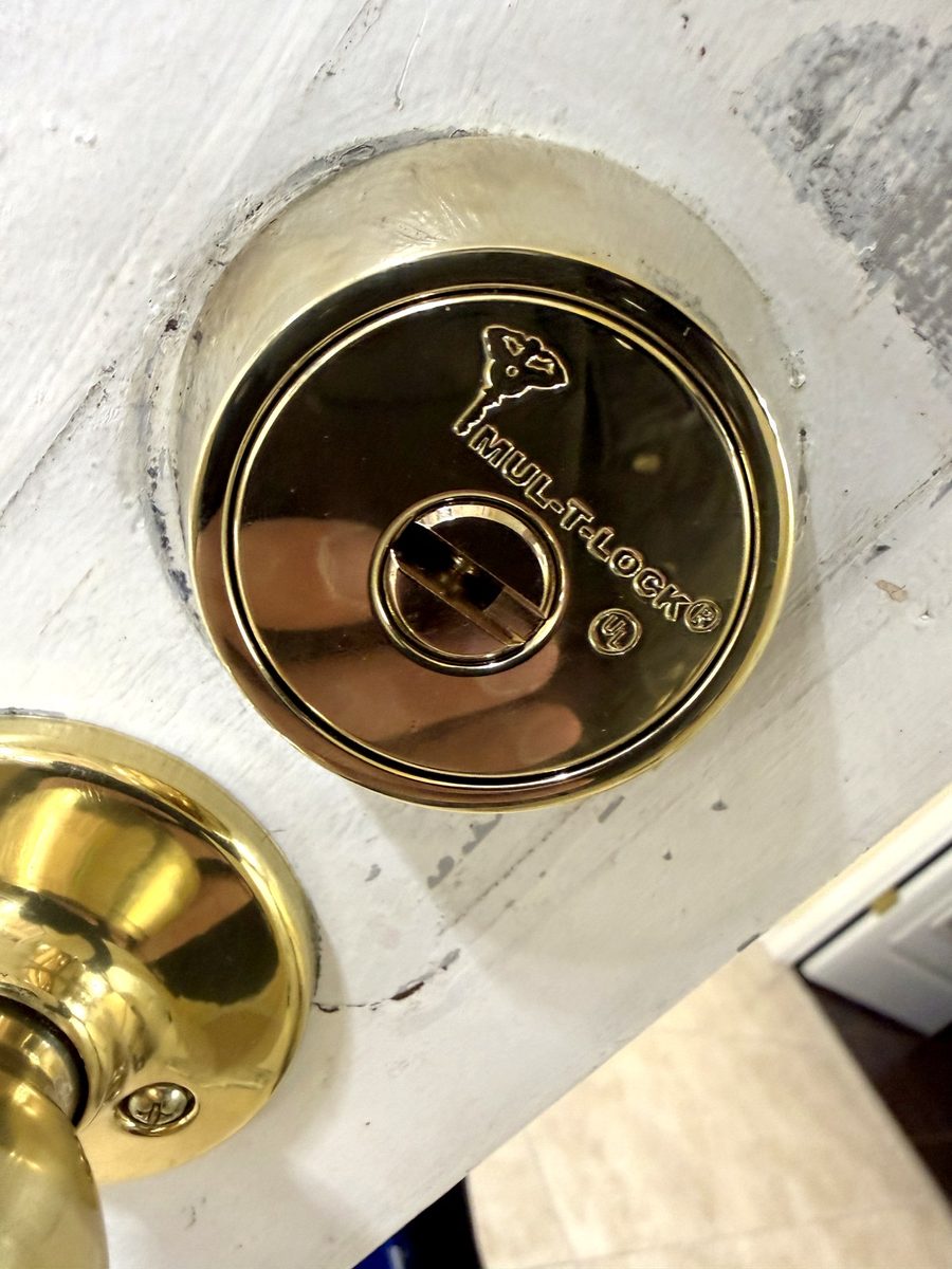 A Mul-T-Lock high-security cylinder fitted to a residential door