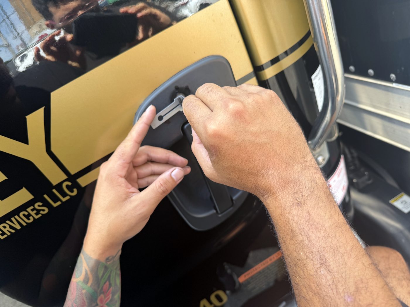 Opening a Freightliner cab door without damaging it — the door was locked, the keys were inside, and nothing on the truck was drilled