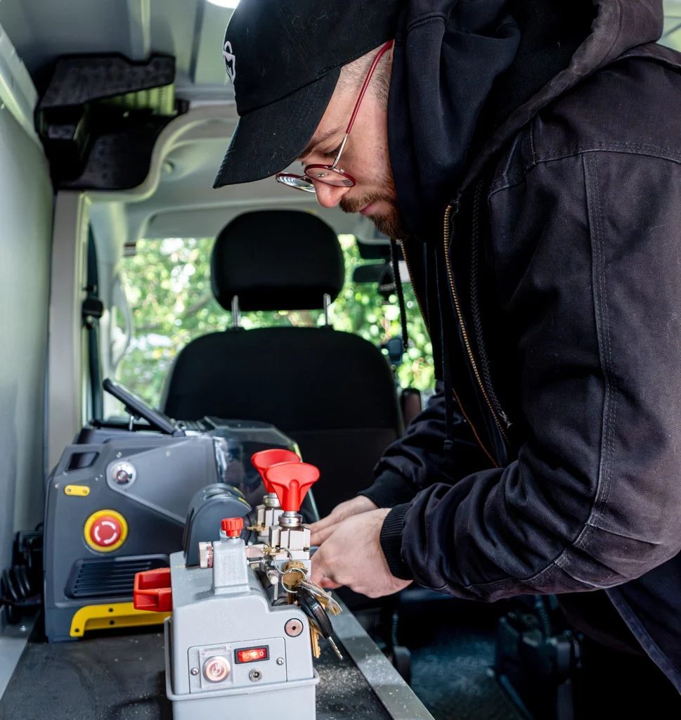Cutting a key on the machine in the van
