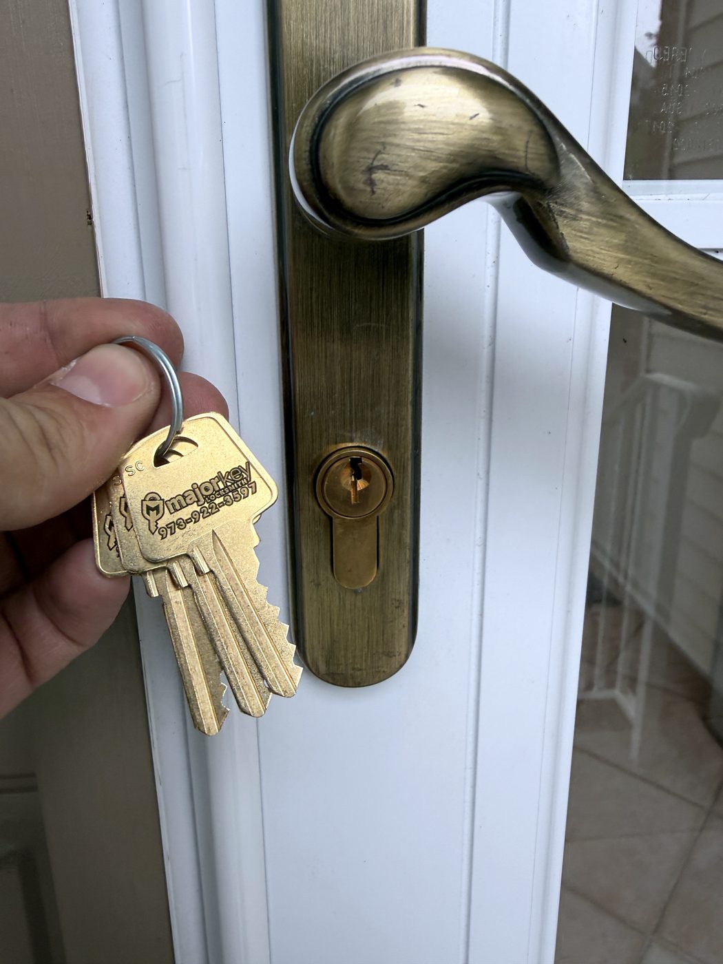 An Andersen lever rekeyed, with the new keys cut and tested on site